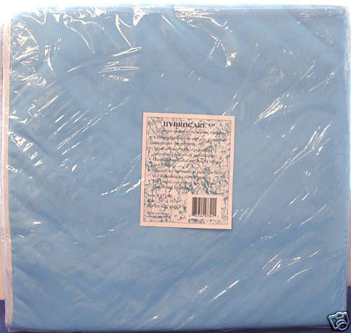 NEW reusable waterproof bed pads 36x34 in package  